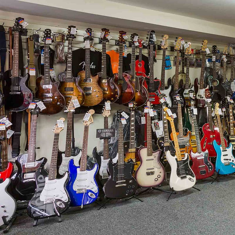 Various guitars for sale in store